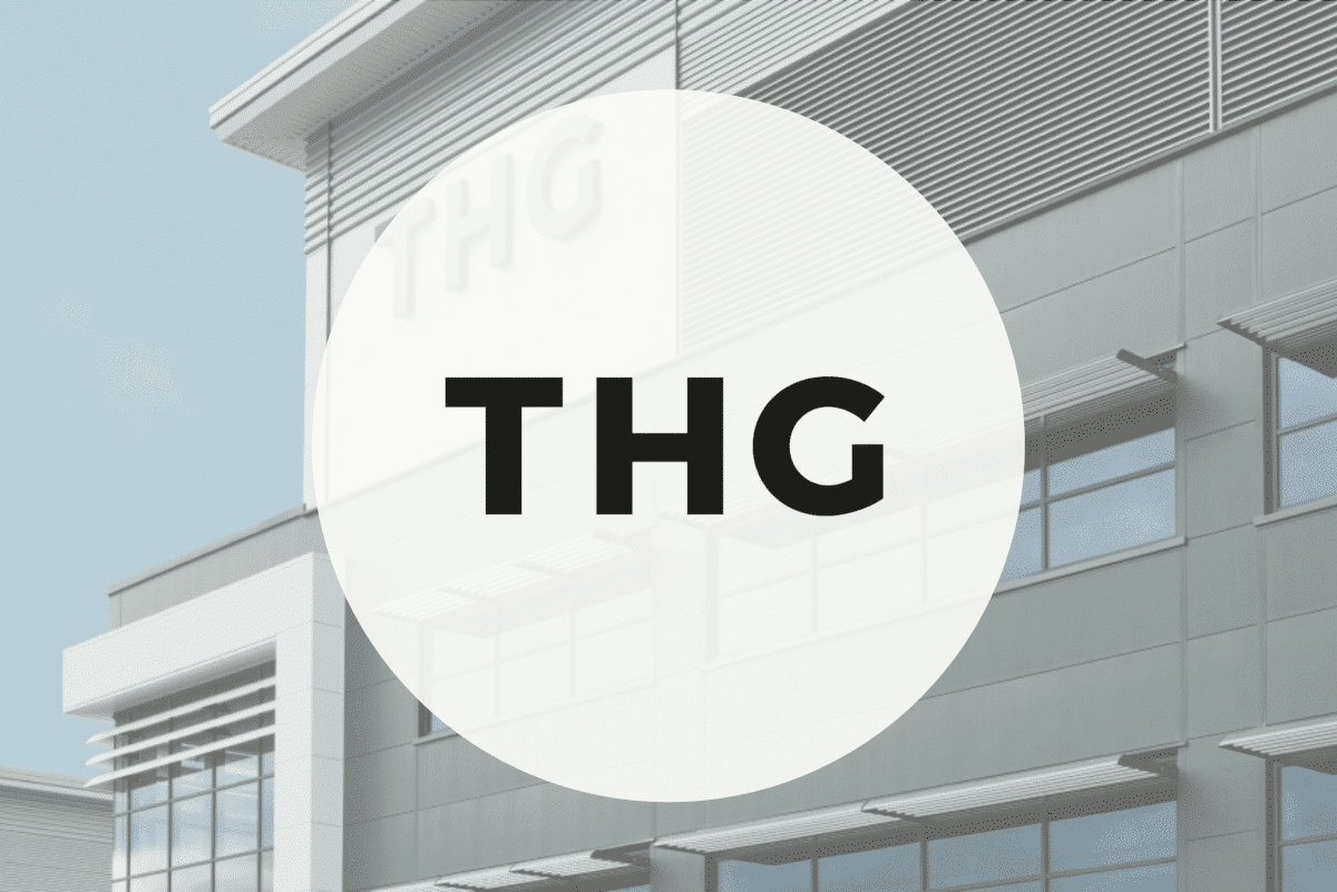 THG-CaseStudy-Logo Black "THG" letters on a white circle, over a modern building background.