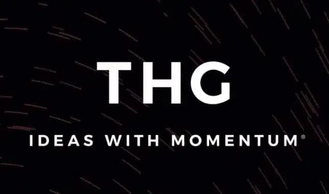 The-Hut-Group-logo THG logo with the tagline "Ideas With Momentum" on a dark background.